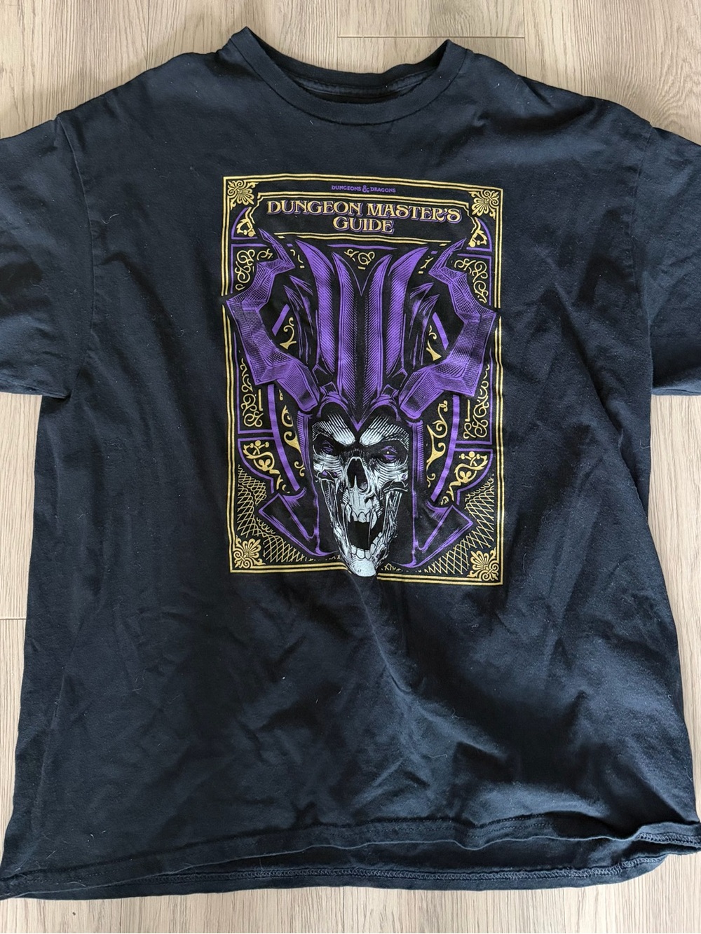 Dungeon Master's Guide Black Graphic Tee with Purple Skull